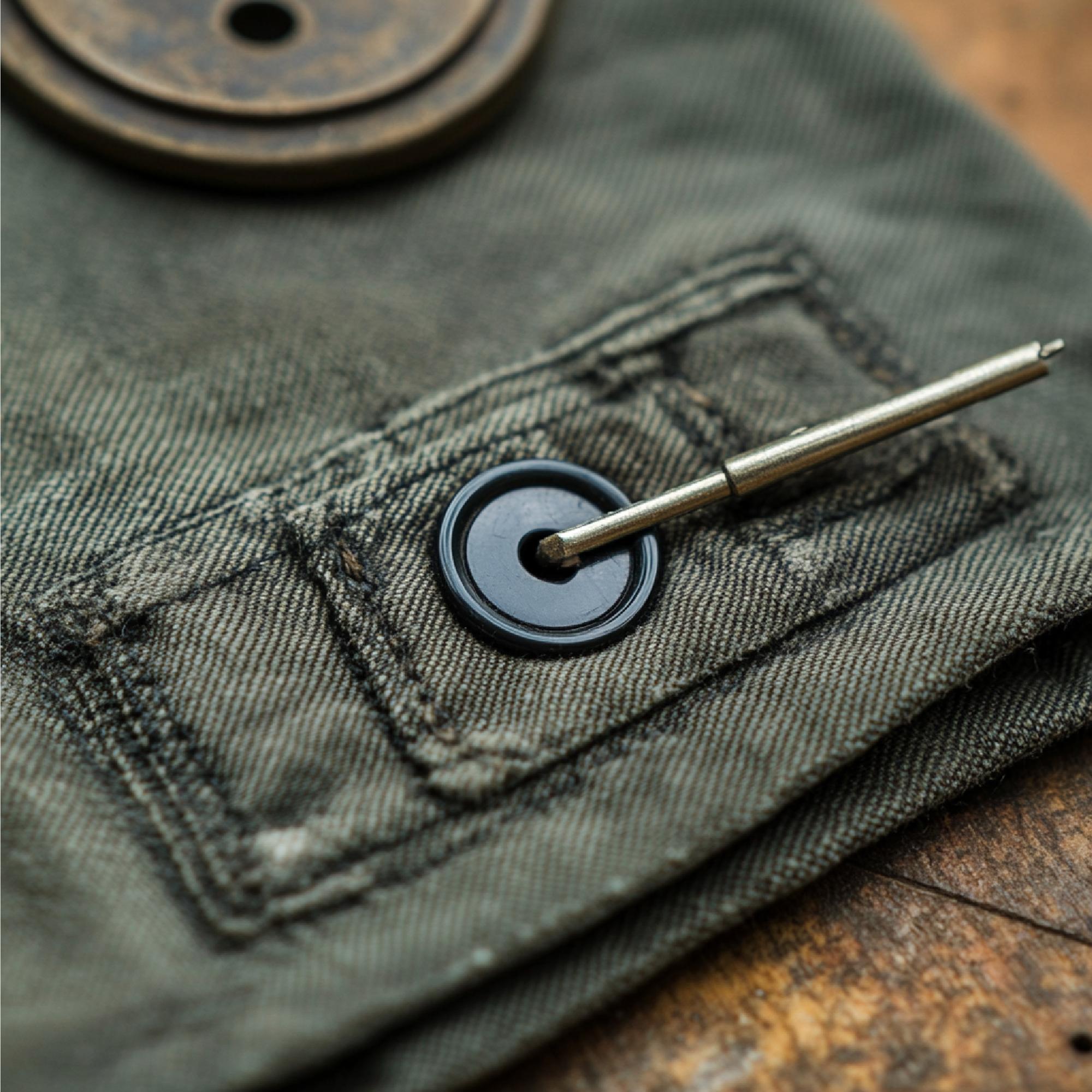 Series of certified emblem patches on table
